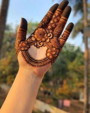 Pakistani Peacock Motif mehndi design for full hand — traditional henna pattern
